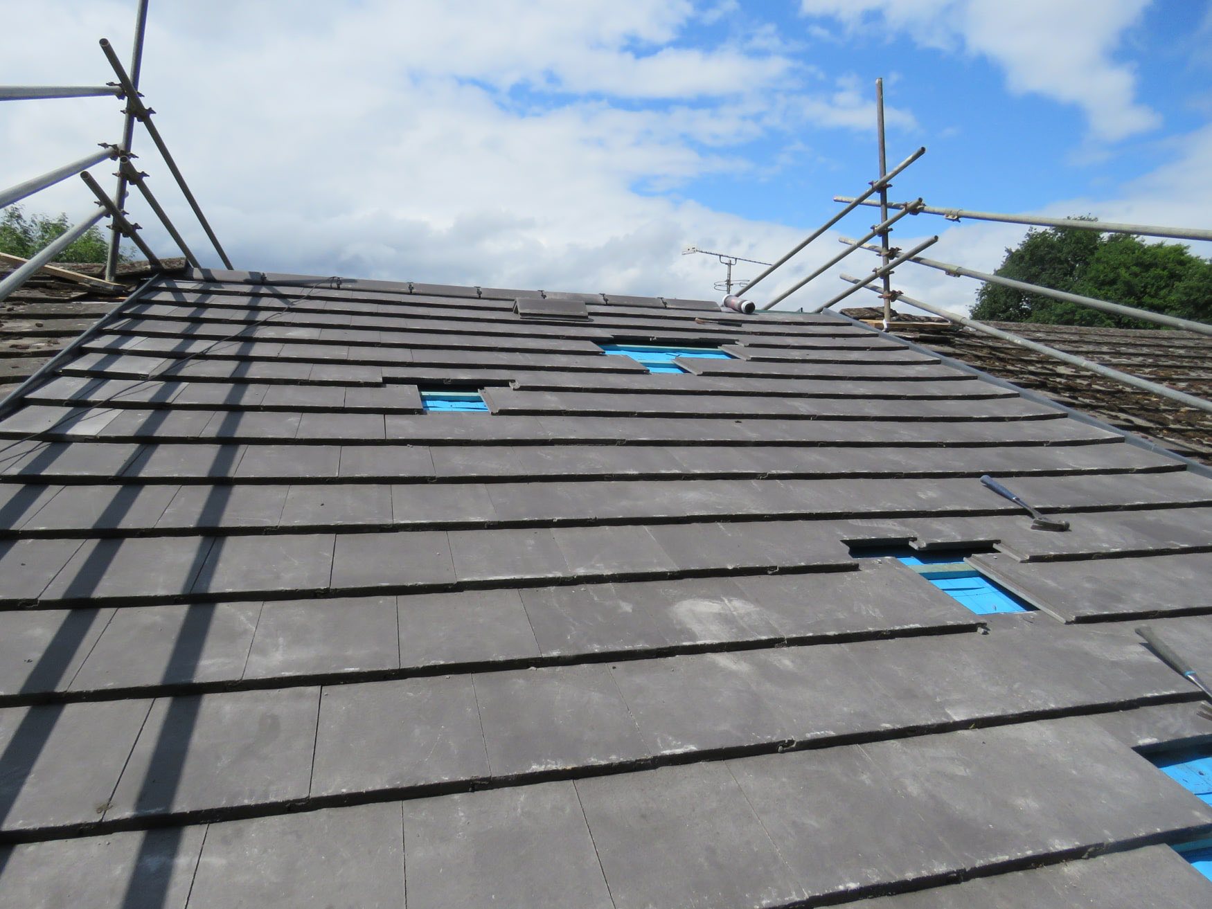 Natural slate roof repair in Axminster